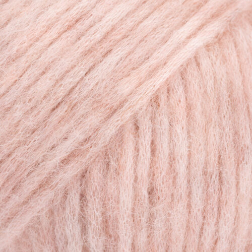 ovillo de lana, alpaca y poliamida de 50 gramos y 150 metros en grosor aran en color rosa del desierto